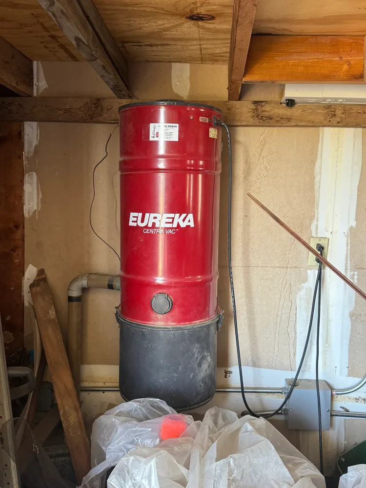 Red Eureka central vacuum power unit