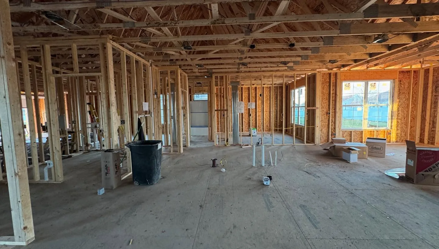 Wide new-home framing with central vacuum rough-in work