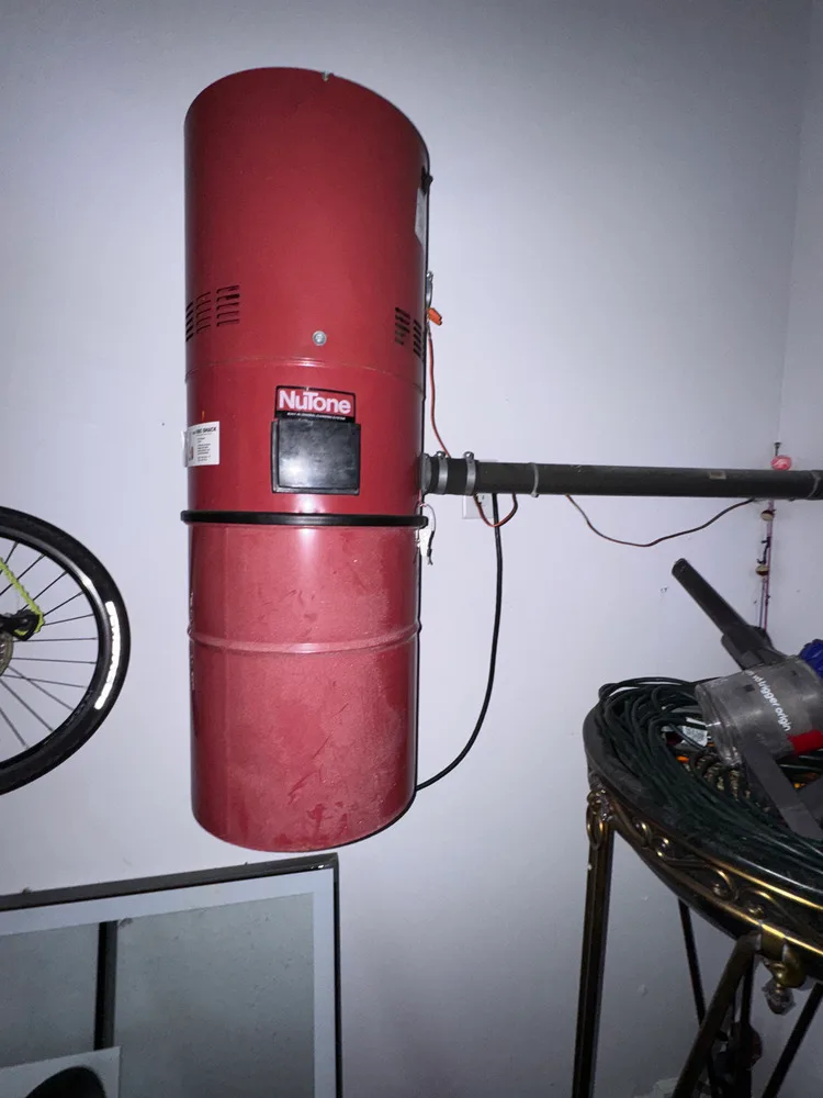 Red NuTone central vacuum power unit