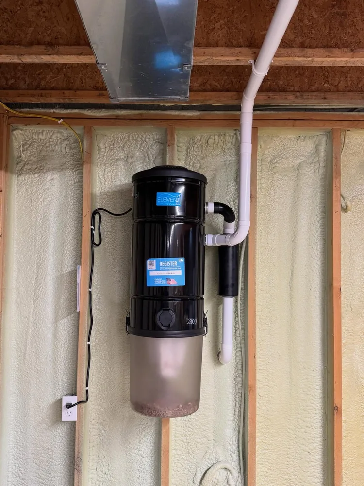 Finished central vacuum power unit in an existing-home retrofit
